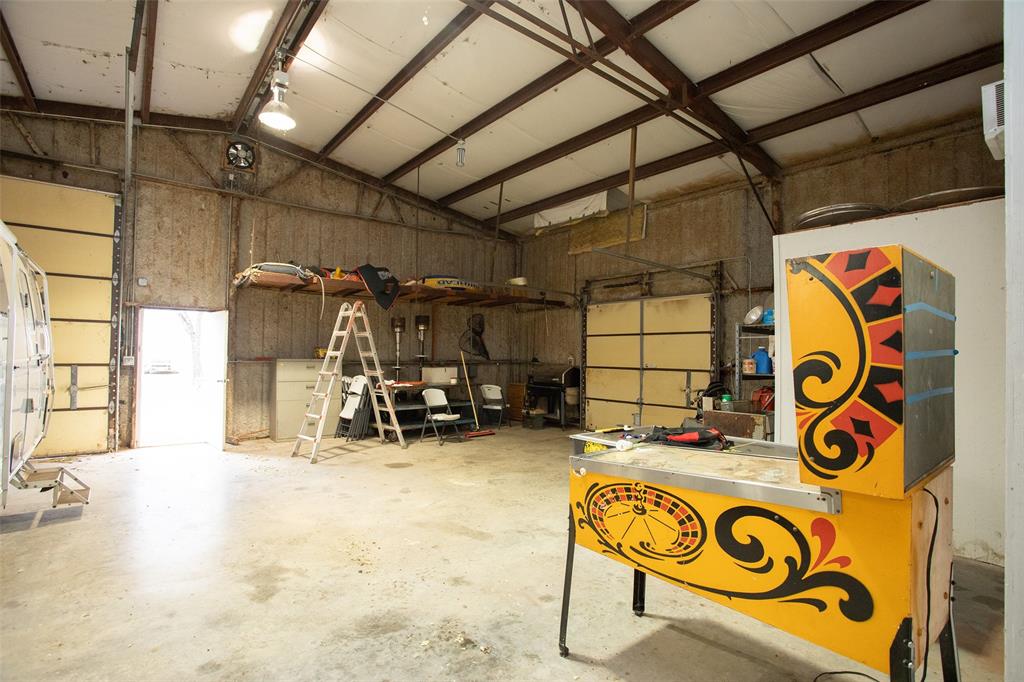 1193 Eastside Lake Road Graham, TX 76450 - Photo 17 of 38 a view of storage and utility room