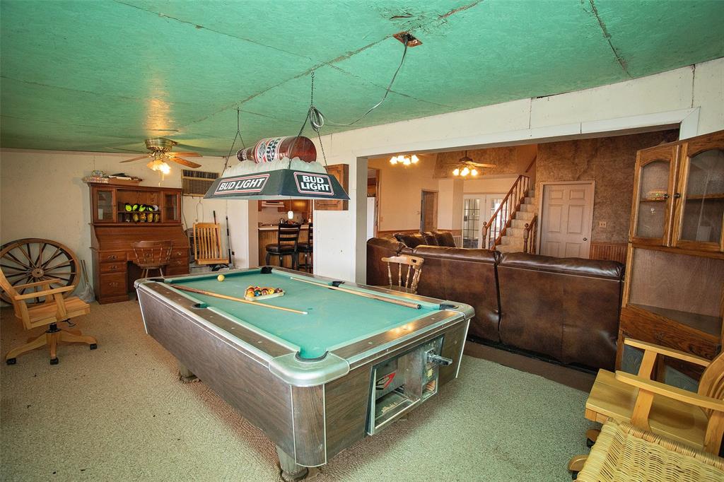 1193 Eastside Lake Road Graham, TX 76450 - Photo 26 of 38 a room with storage and utility