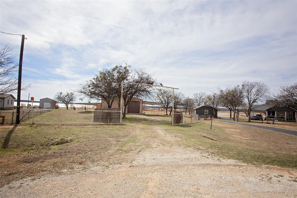 1193 Eastside Lake Road Graham, TX 76450 - Photo 31 of 38 a view of a yard with a house