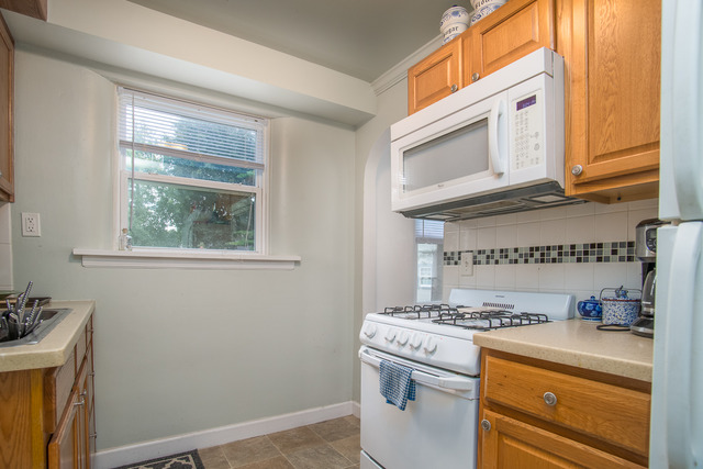 263-265 Chicago Road Oswego, IL 60543 - Photo 2 of 25 a view of washer and dryer with a utility room
