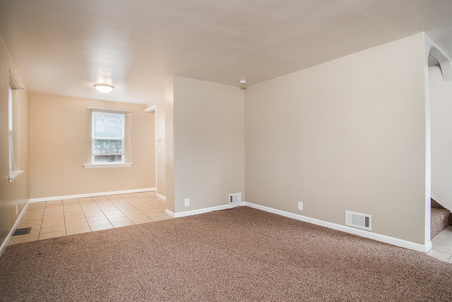 263-265 Chicago Road Oswego, IL 60543 - Photo 15 of 25 an empty room with a window