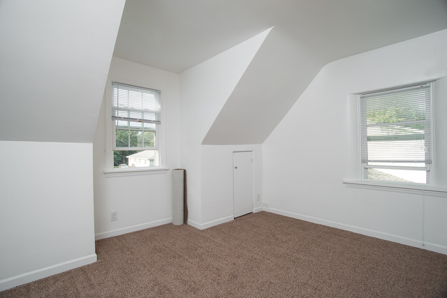 263-265 Chicago Road Oswego, IL 60543 - Photo 17 of 25 an empty room with windows
