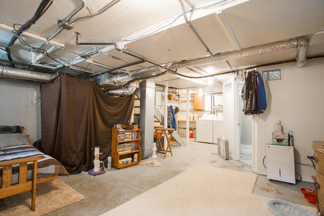263-265 Chicago Road Oswego, IL 60543 - Photo 21 of 25 a view of storage and utility room