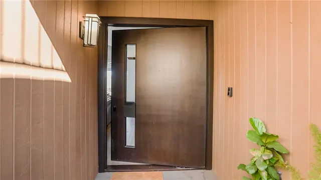a living room with furniture fireplace and flat screen tv