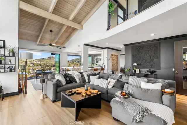 a kitchen with stainless steel appliances kitchen island granite countertop lots of counter top space and a large window