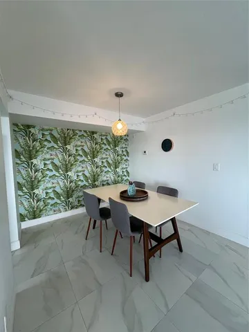 a table and chairs in a room