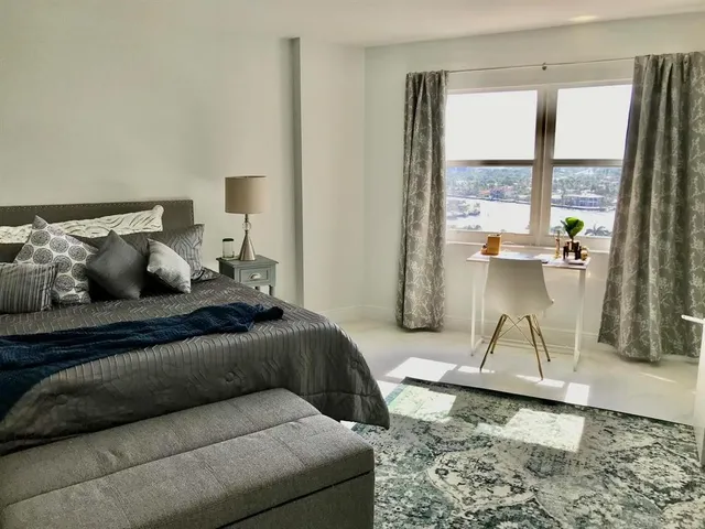 a living room with a couch and a table