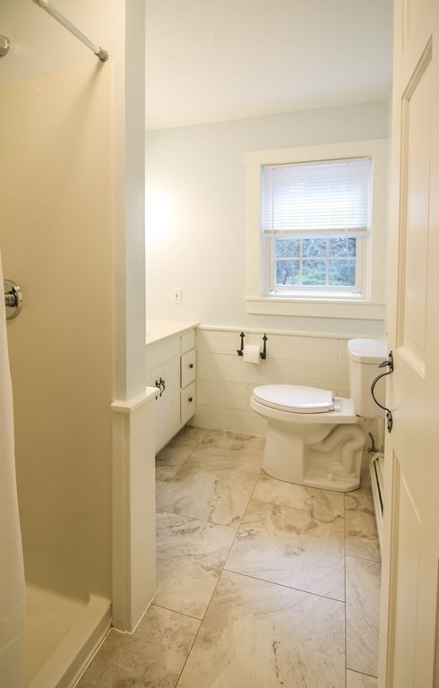 69 John Gilbert Road West Brookfield, MA 01585 - Photo 15 of 41 a bathroom with a granite countertop toilet and a sink