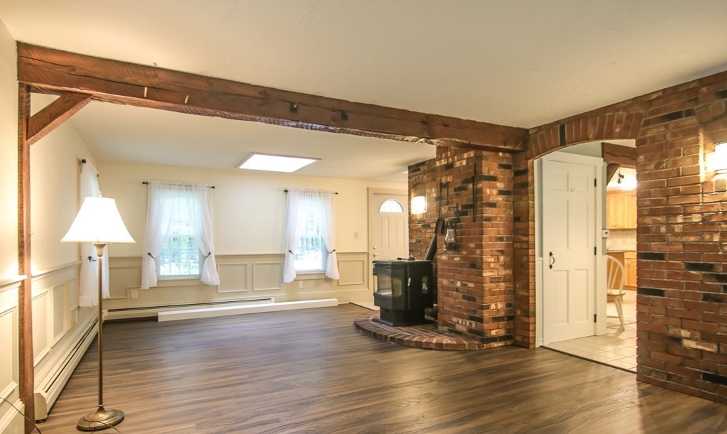 69 John Gilbert Road West Brookfield, MA 01585 - Photo 20 of 41 a view of empty room with wooden floor and fan