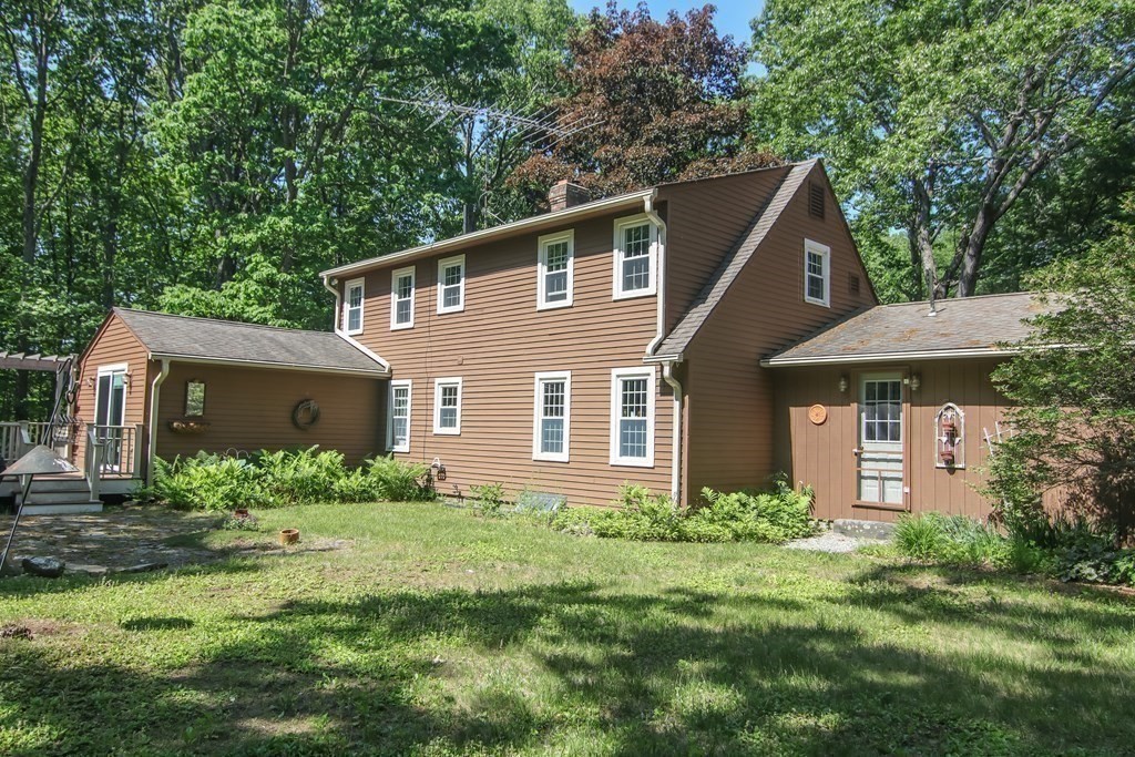 69 John Gilbert Road West Brookfield, MA 01585 - Photo 27 of 41 a front view of house with yard and green space