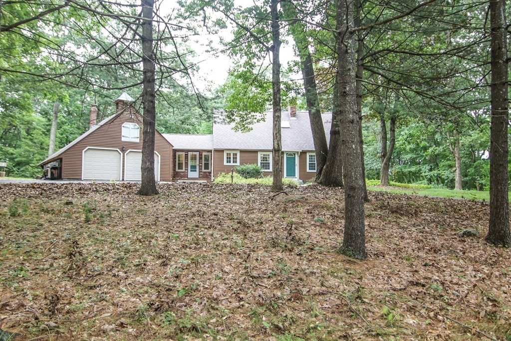 69 John Gilbert Road West Brookfield, MA 01585 - Photo 3 of 41 a front view of a house with a yard