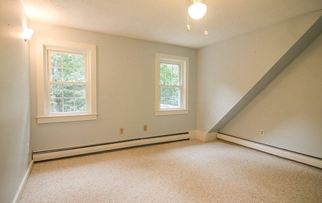 69 John Gilbert Road West Brookfield, MA 01585 - Photo 32 of 41 an empty room with windows