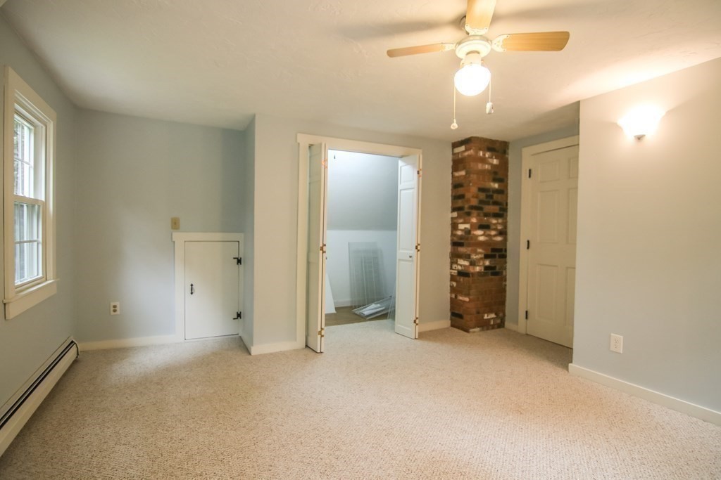 69 John Gilbert Road West Brookfield, MA 01585 - Photo 33 of 41 an empty room with closet and entryway