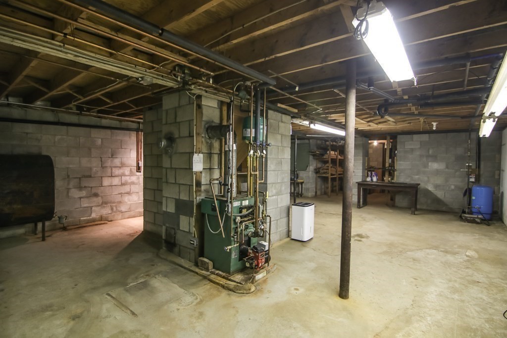 69 John Gilbert Road West Brookfield, MA 01585 - Photo 41 of 41 a view of an empty room with wooden floor