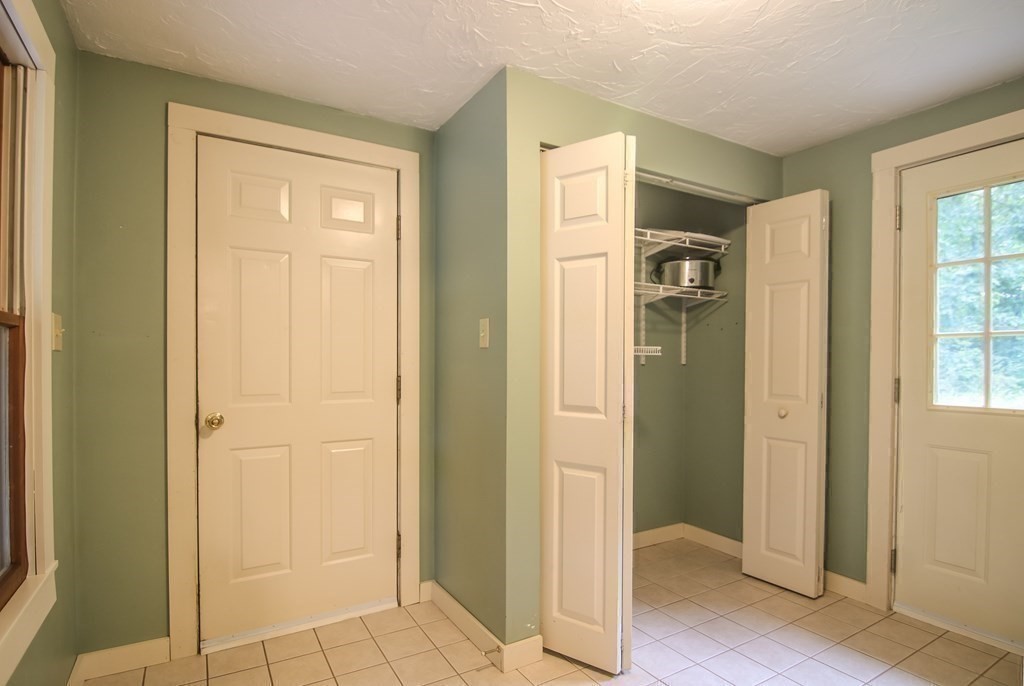 69 John Gilbert Road West Brookfield, MA 01585 - Photo 7 of 41 a view of a hallway with wooden floor