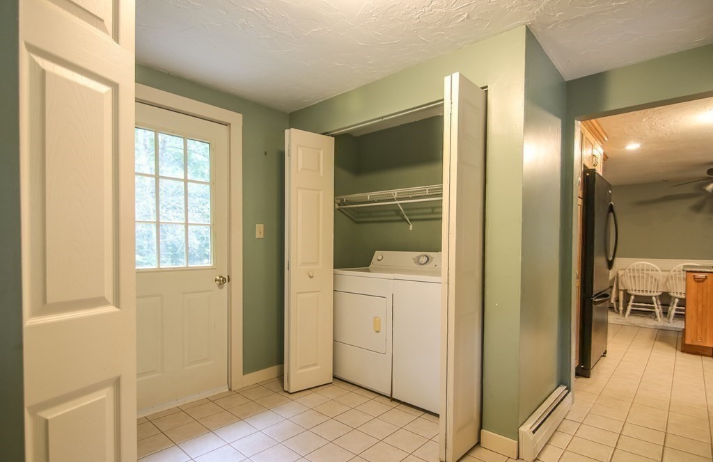 69 John Gilbert Road West Brookfield, MA 01585 - Photo 8 of 41 a bathroom with a glass door shower and a sink