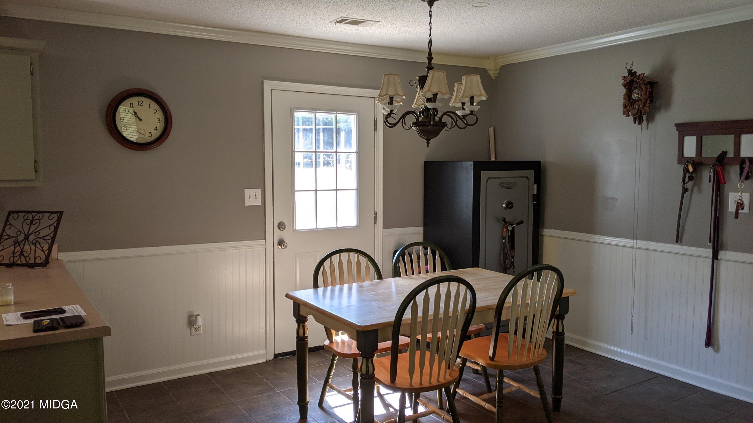 140 Rock Springs Road Milner, GA 30257 - Photo 6 of 15 a view of a room with furniture window and wooden floor
