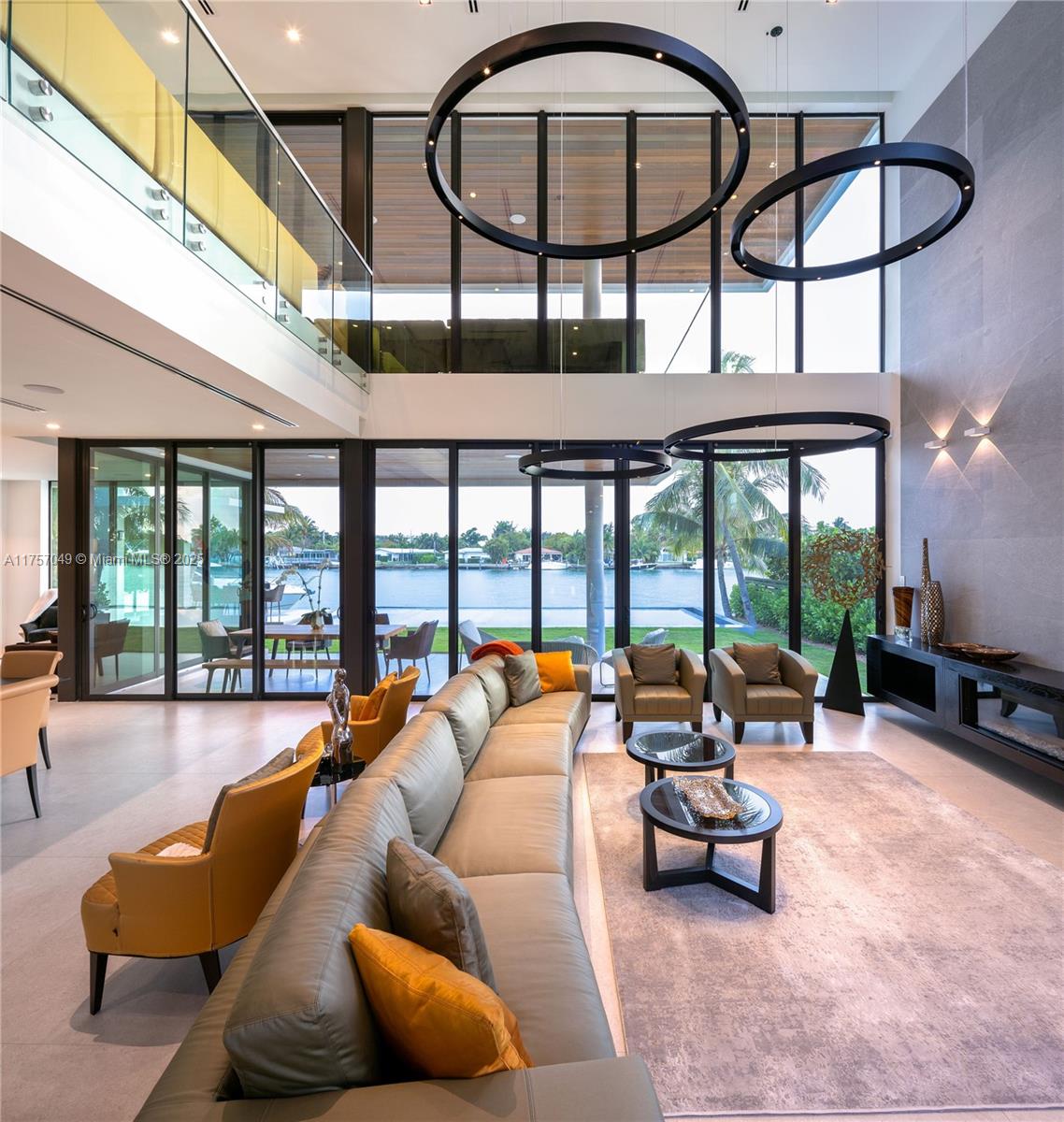 1234 South Biscayne Point Road Miami Beach, FL 33141 - Photo 12 of 30 a living room with furniture and a floor to ceiling window