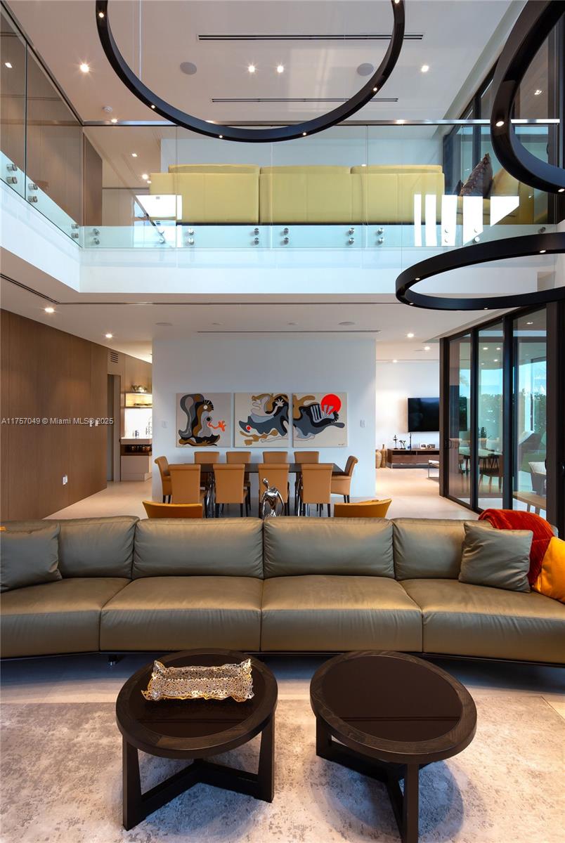 1234 South Biscayne Point Road Miami Beach, FL 33141 - Photo 15 of 30 a outdoor living space with furniture and a fireplace