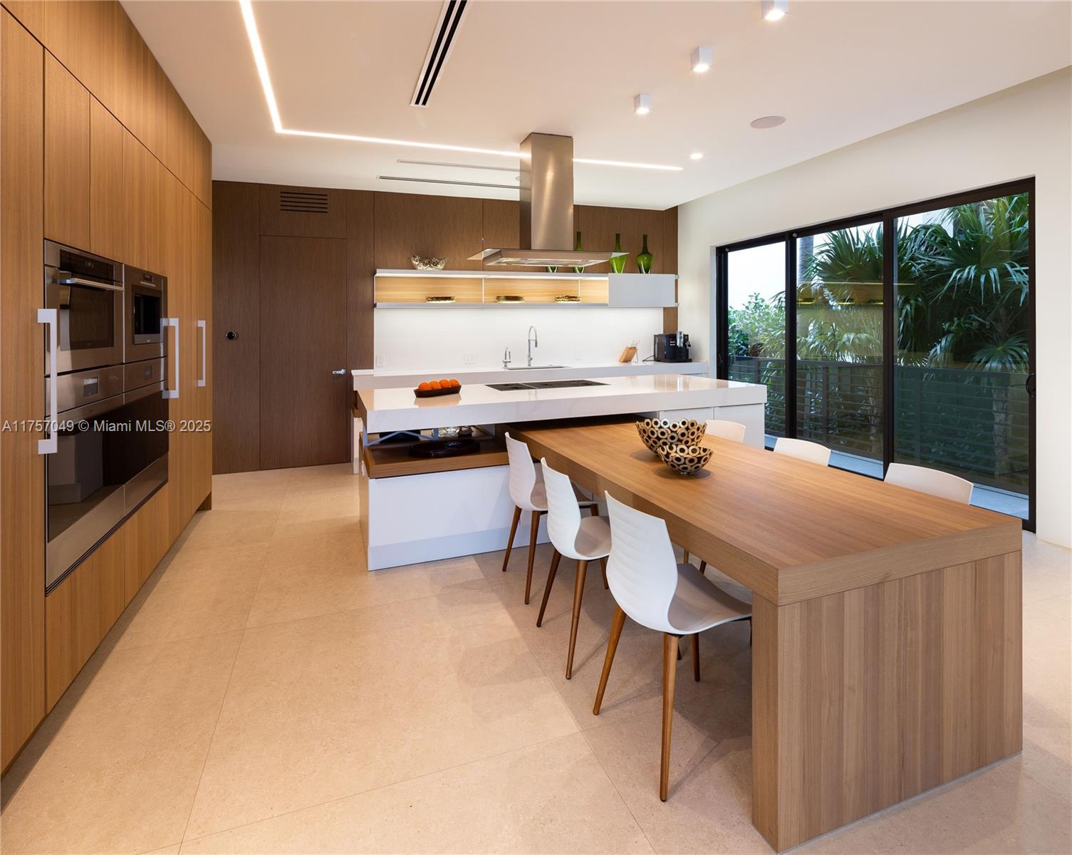 1234 South Biscayne Point Road Miami Beach, FL 33141 - Photo 19 of 30 a kitchen with stainless steel appliances a stove a sink and a refrigerator