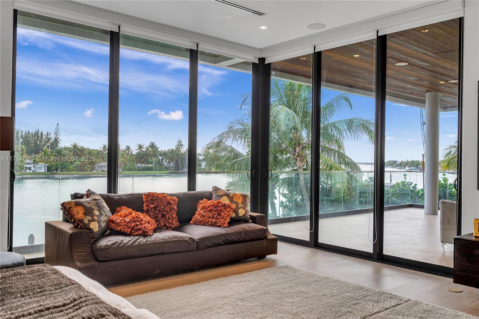 1234 South Biscayne Point Road Miami Beach, FL 33141 - Photo 25 of 30 a living room with couch and a large window