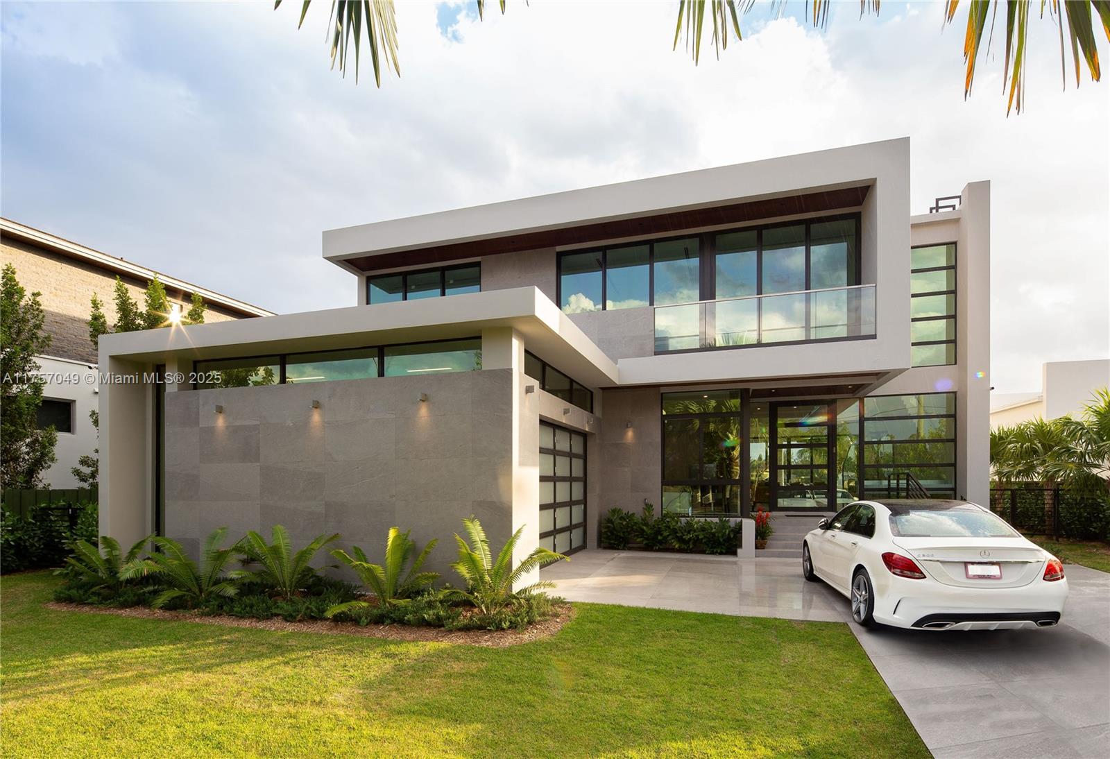 1234 South Biscayne Point Road Miami Beach, FL 33141 - Photo 6 of 30 a car parked in front of a house