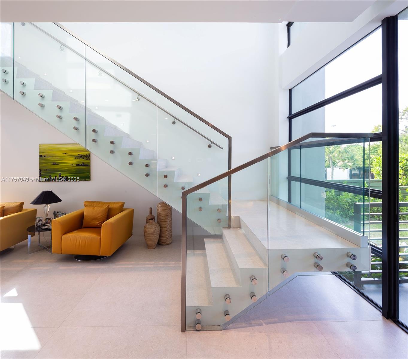 1234 South Biscayne Point Road Miami Beach, FL 33141 - Photo 9 of 30 a living room with furniture and white walls