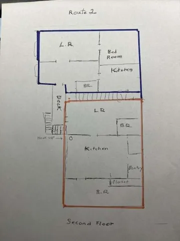 a view of a fire pit with large trees