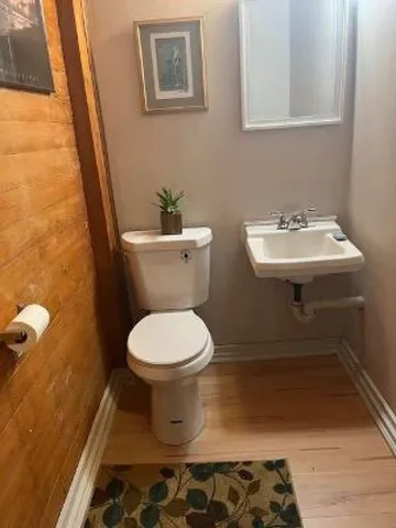 a bathroom with a sink and toilet