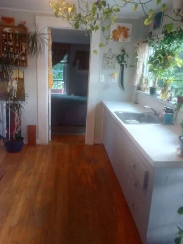 a view of a livingroom with furniture and window