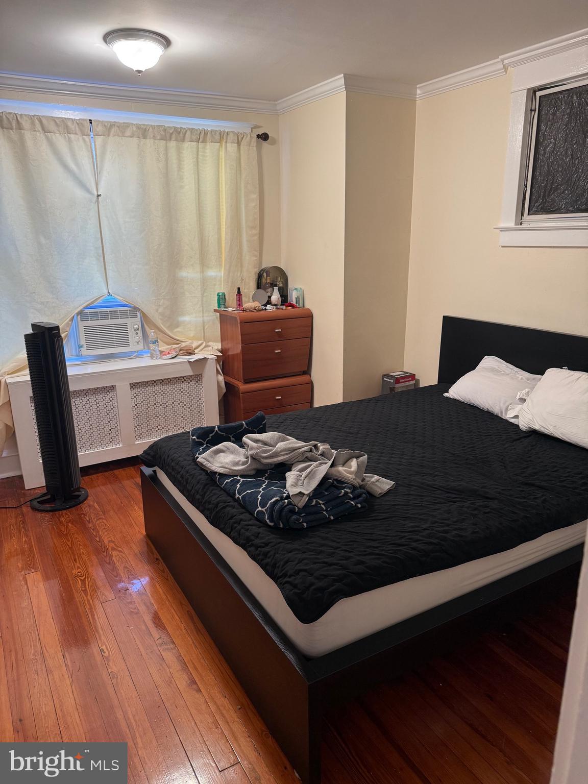 528 Magee Avenue Philadelphia, PA 19111 - Photo 15 of 29 a living room with a bed furniture and a window