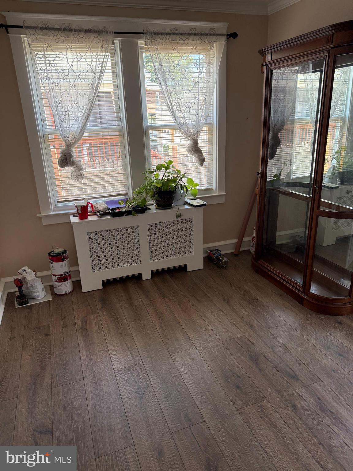 528 Magee Avenue Philadelphia, PA 19111 - Photo 2 of 29 a room with wooden floor and a window