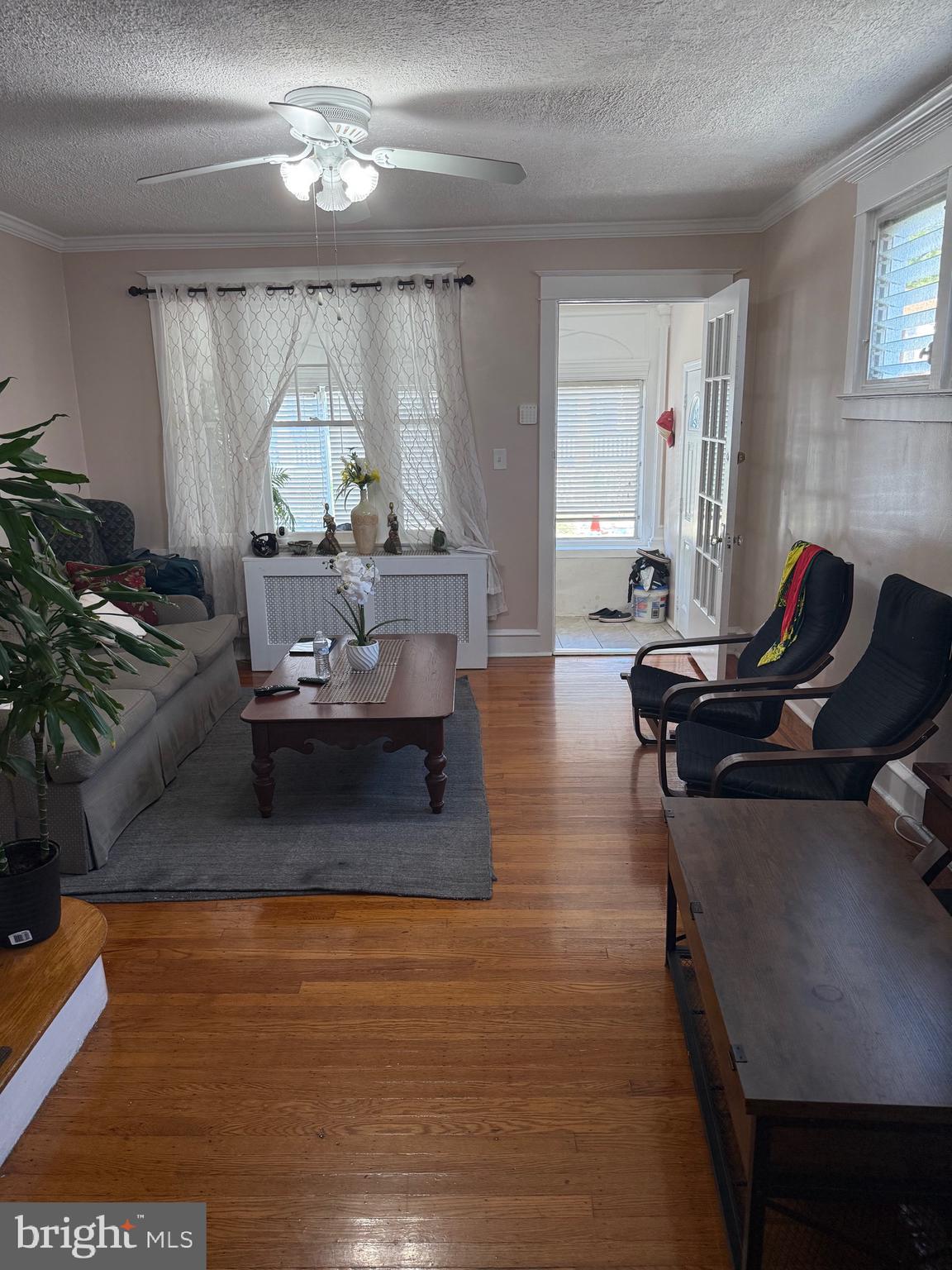 528 Magee Avenue Philadelphia, PA 19111 - Photo 23 of 29 a living room with furniture and a wooden floor