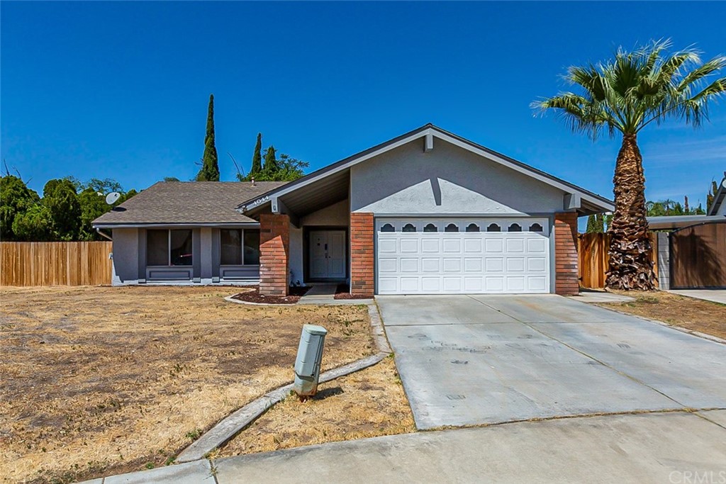 4044 Ballad Place Riverside, CA 92505 - Photo 1 of 1 a front view of a house with garden