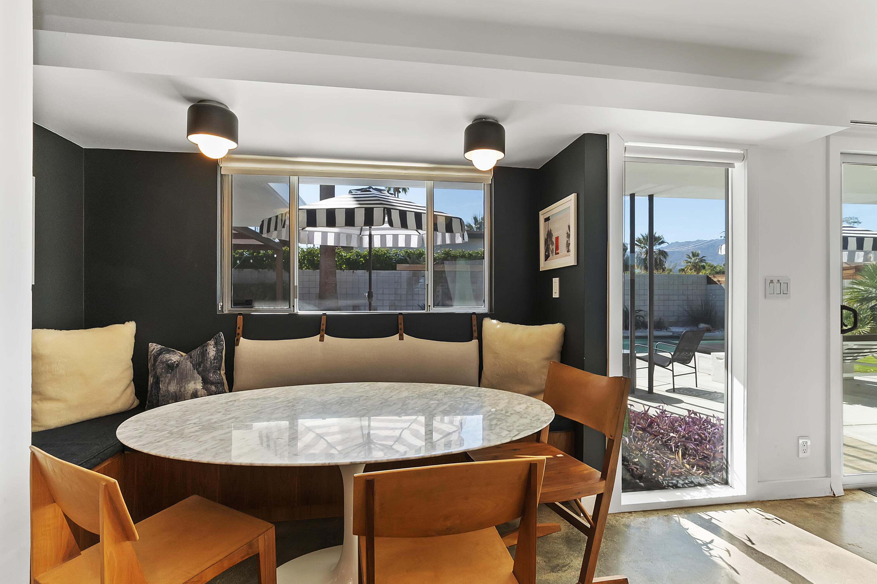 45876 Abronia Trail Palm Desert, CA 92260 - Photo 11 of 26 a living room with furniture and a table