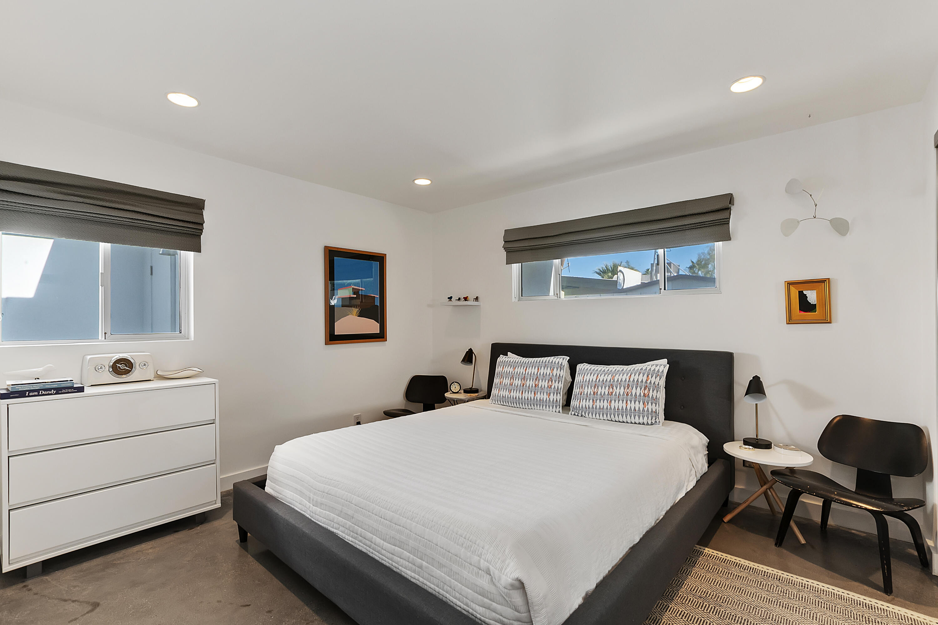 45876 Abronia Trail Palm Desert, CA 92260 - Photo 13 of 26 a bedroom with a bed and a desk