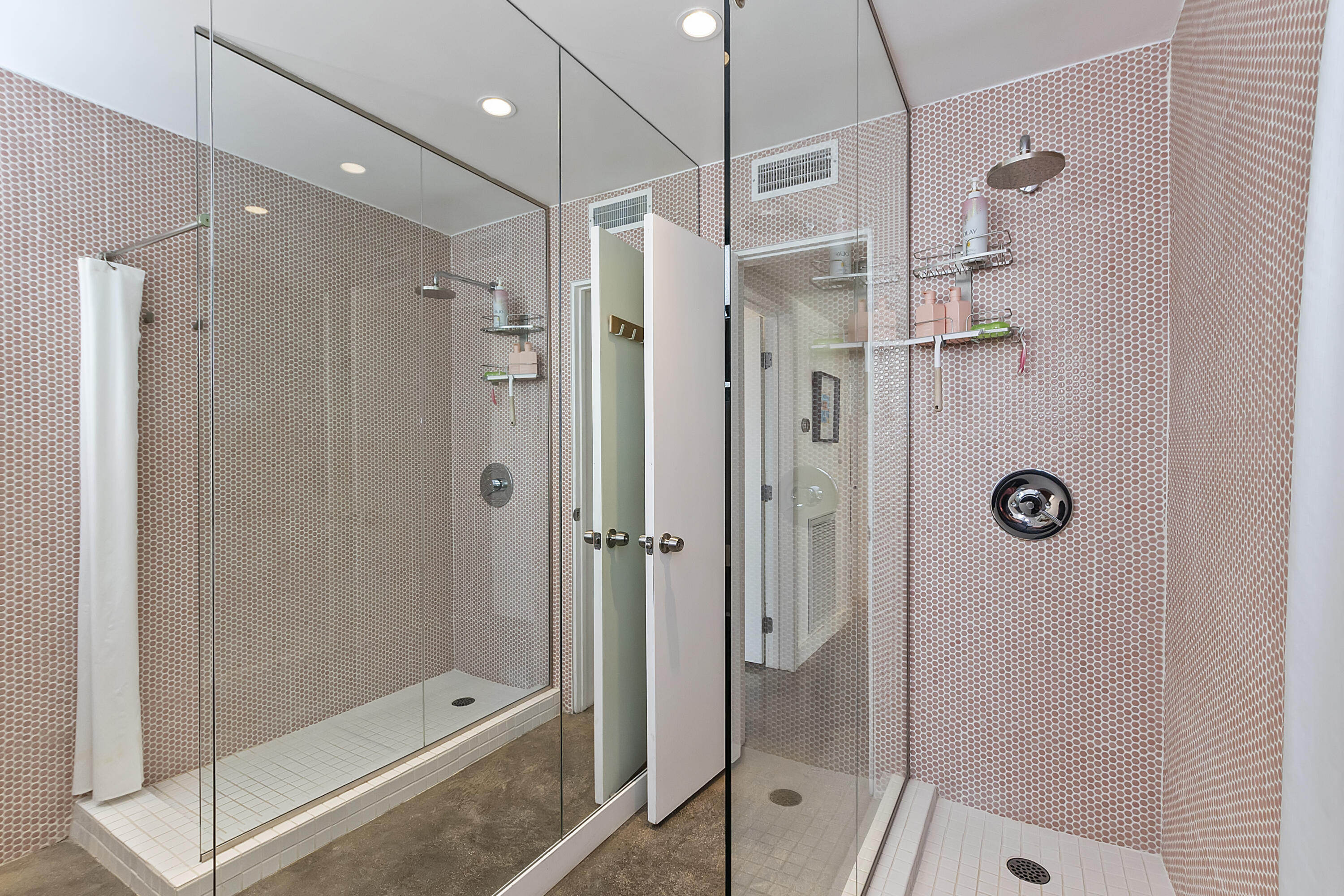 45876 Abronia Trail Palm Desert, CA 92260 - Photo 15 of 26 a bathroom with a shower and a glass door