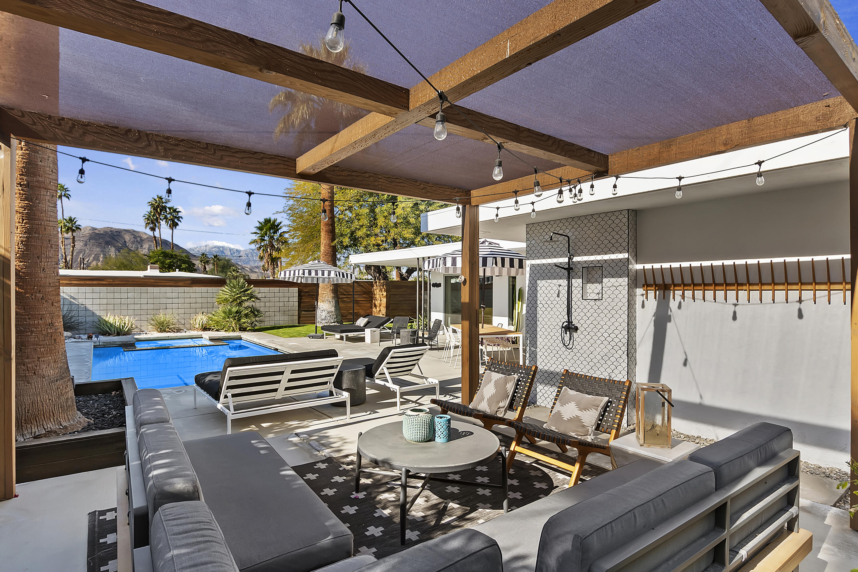 45876 Abronia Trail Palm Desert, CA 92260 - Photo 21 of 26 a table and chairs in the patio