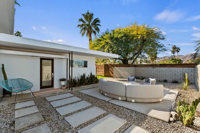 a building outdoor space with patio furniture