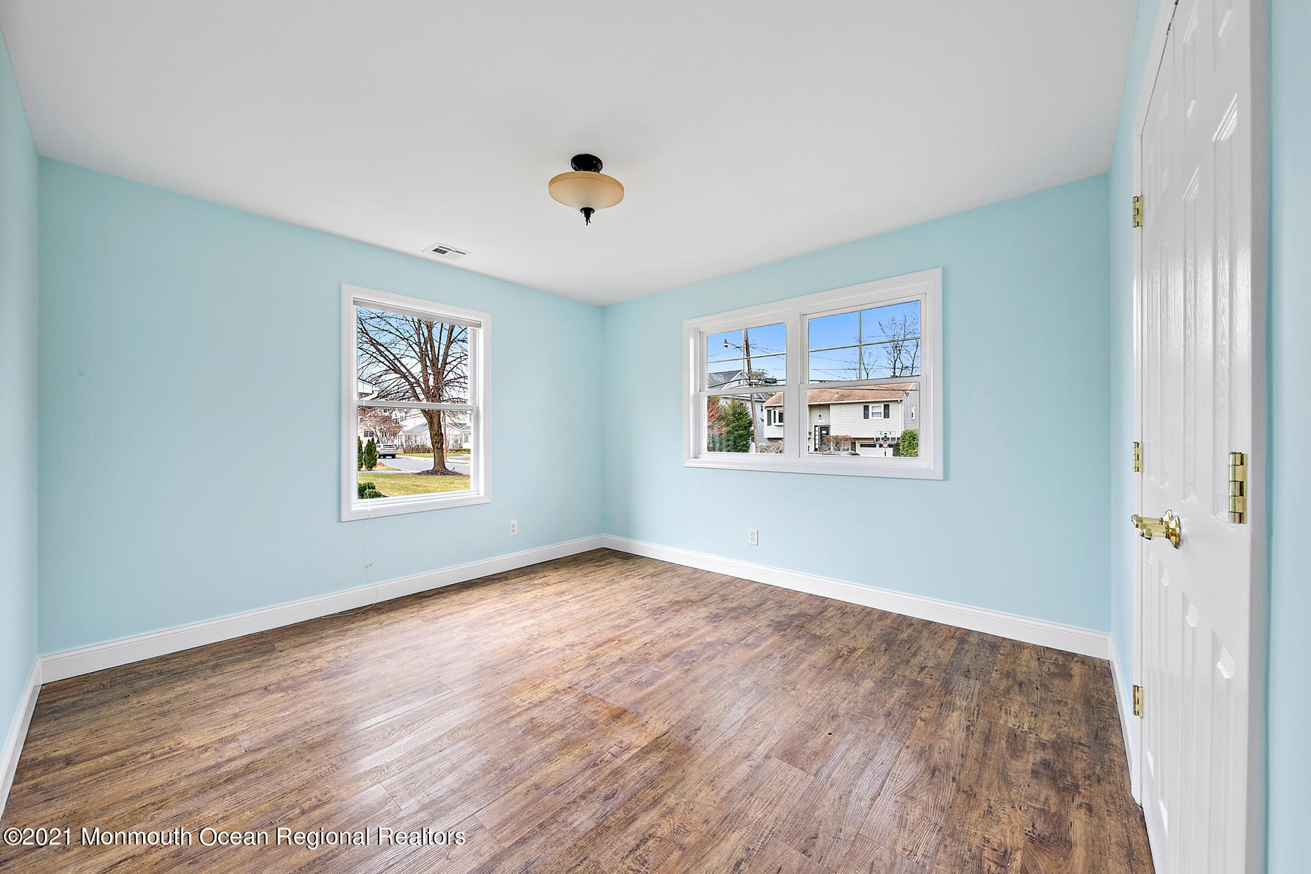 94 Jackson Street Fair Haven, NJ 07704 - Photo 22 of 83 a view of an empty room with a window and wooden floor
