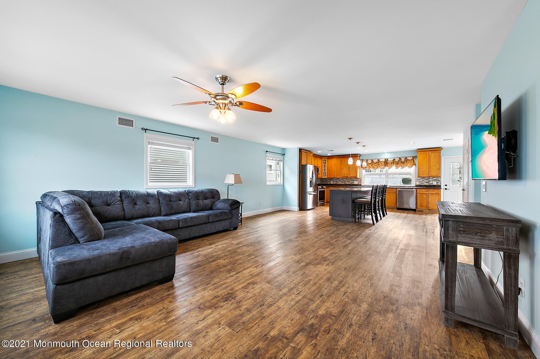 94 Jackson Street Fair Haven, NJ 07704 - Photo 4 of 83 a living room with furniture and a flat screen tv with wooden floor