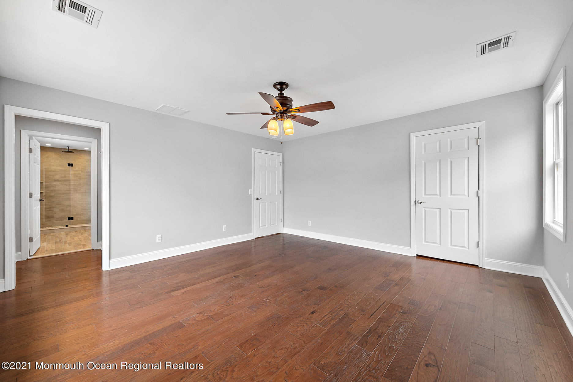 94 Jackson Street Fair Haven, NJ 07704 - Photo 31 of 83 wooden floor in an empty room with a window
