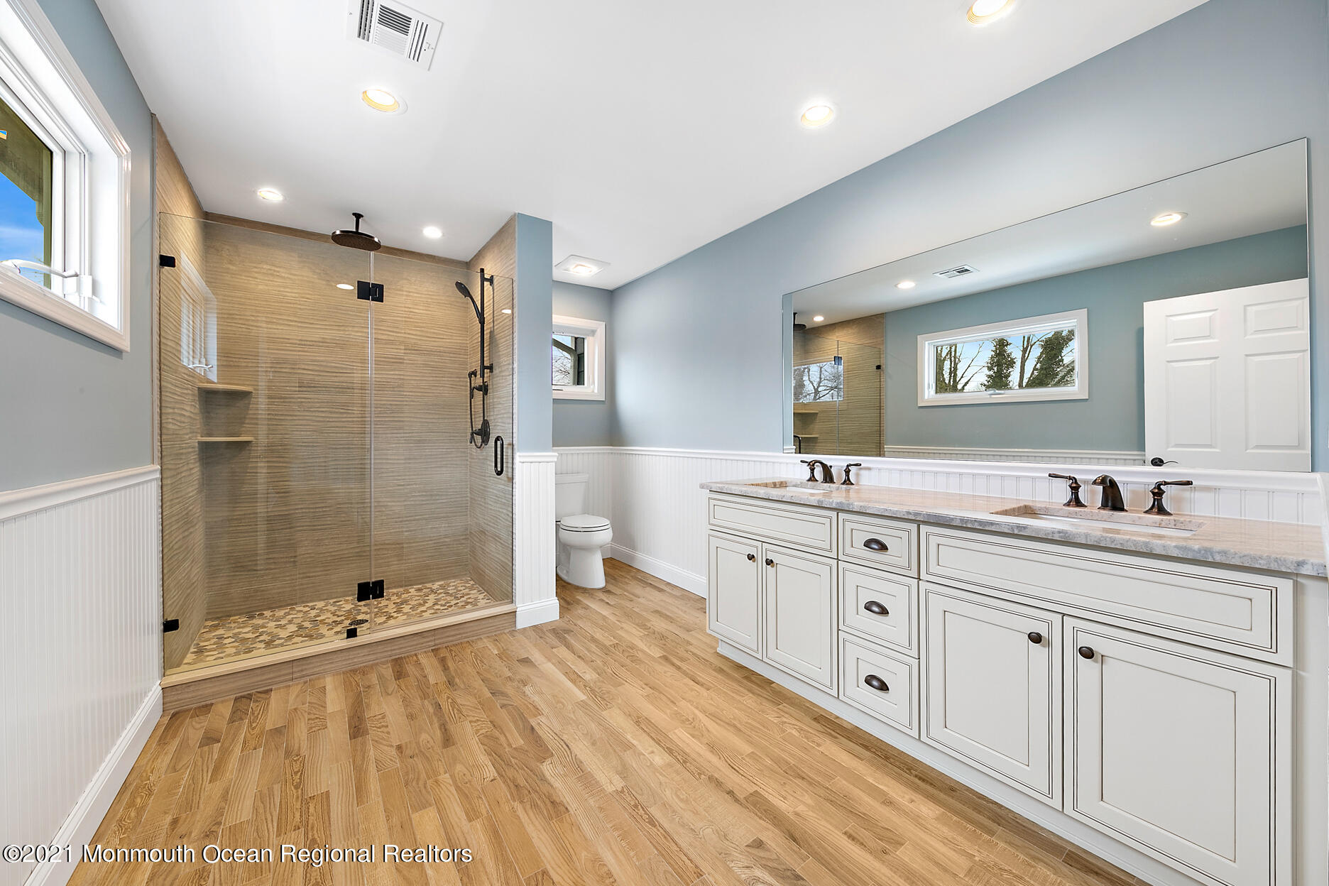 94 Jackson Street Fair Haven, NJ 07704 - Photo 33 of 83 a spacious bathroom with a double vanity sink a mirror and a shower