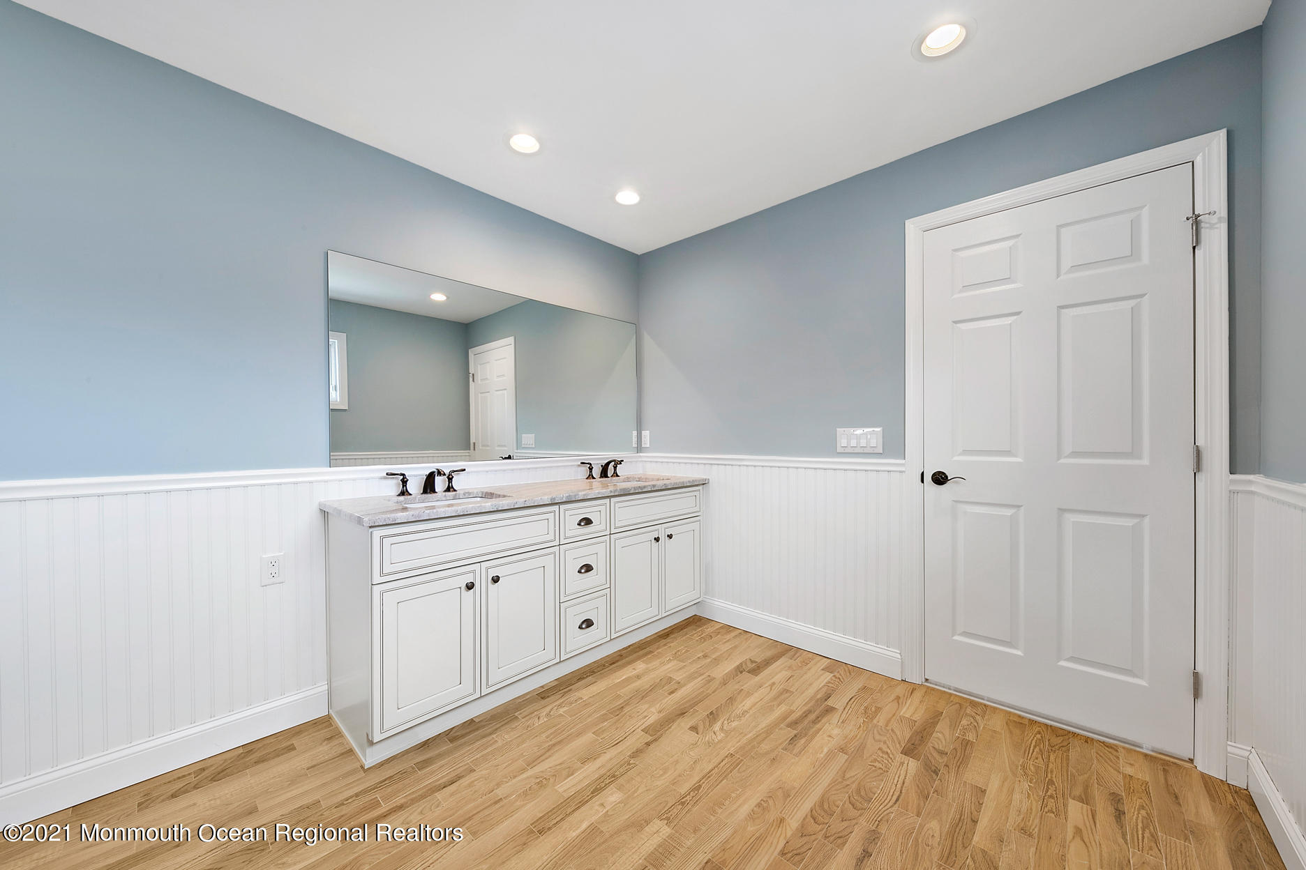 94 Jackson Street Fair Haven, NJ 07704 - Photo 34 of 83 a bathroom with a sink vanity and mirror