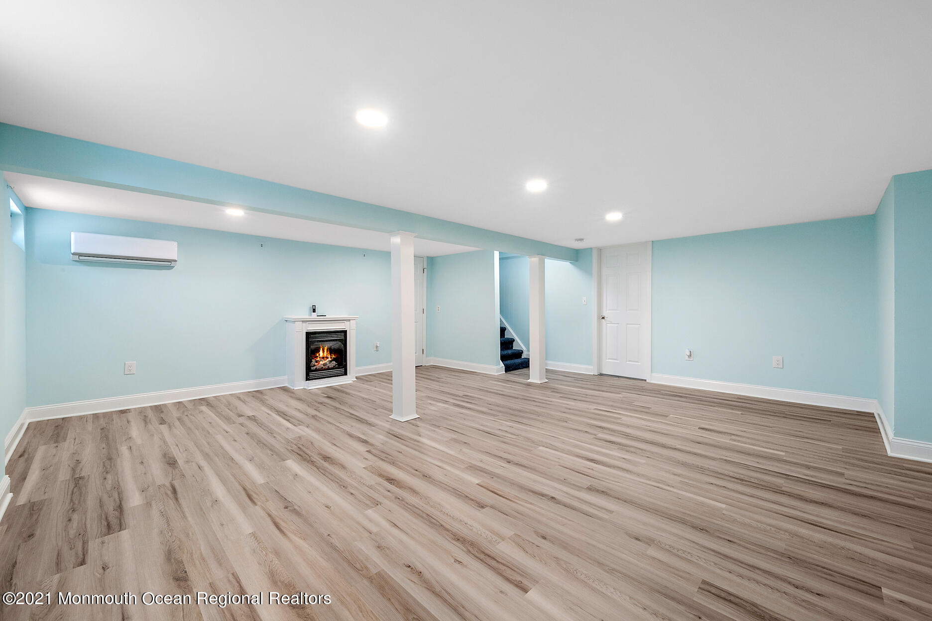 94 Jackson Street Fair Haven, NJ 07704 - Photo 45 of 83 a view of empty room with wooden floor and fireplace