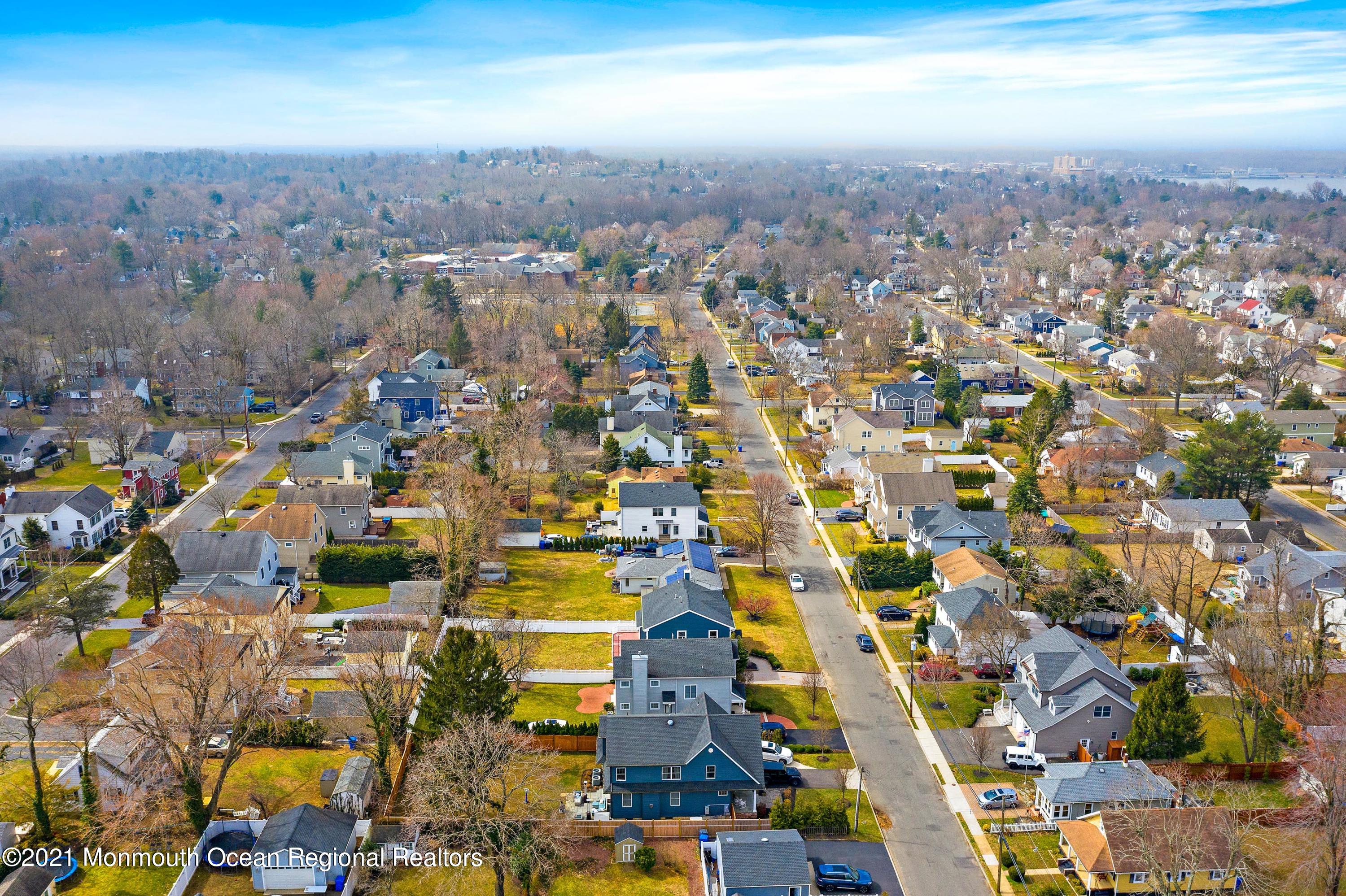 94 Jackson Street Fair Haven, NJ 07704 - Photo 63 of 83 an aerial view of residential houses with outdoor space