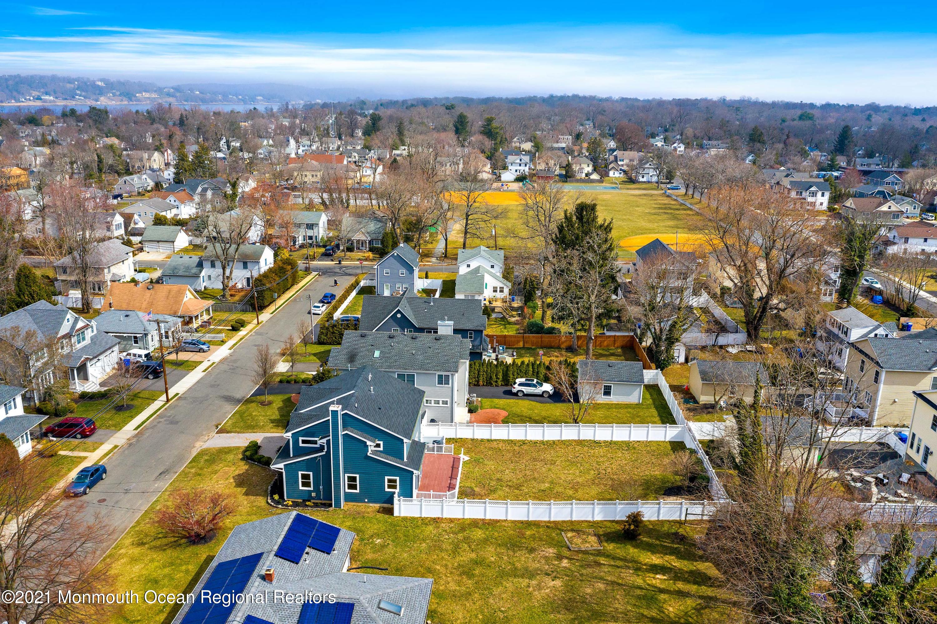 94 Jackson Street Fair Haven, NJ 07704 - Photo 67 of 83 an aerial view of residential houses with outdoor space