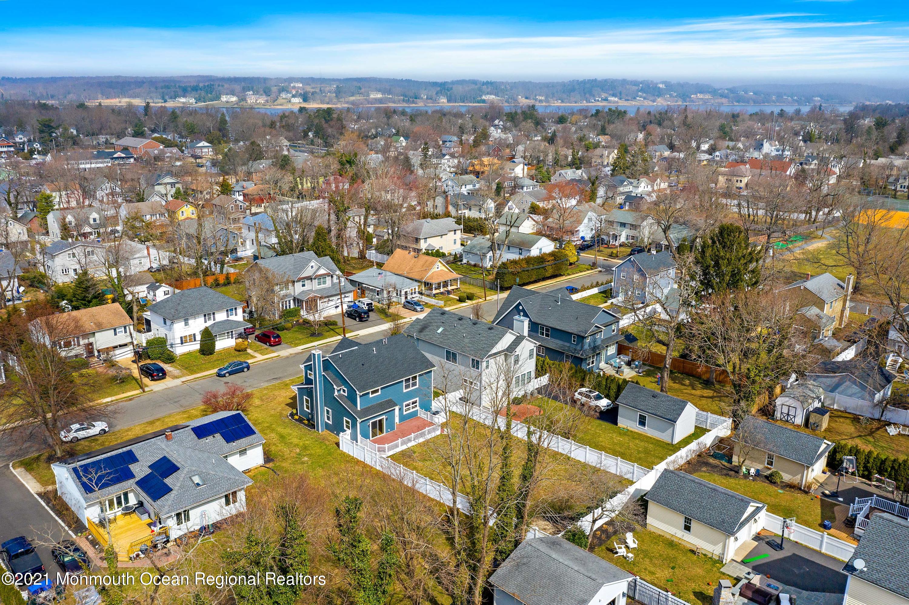 94 Jackson Street Fair Haven, NJ 07704 - Photo 68 of 83 an aerial view of a city with lots of residential buildings