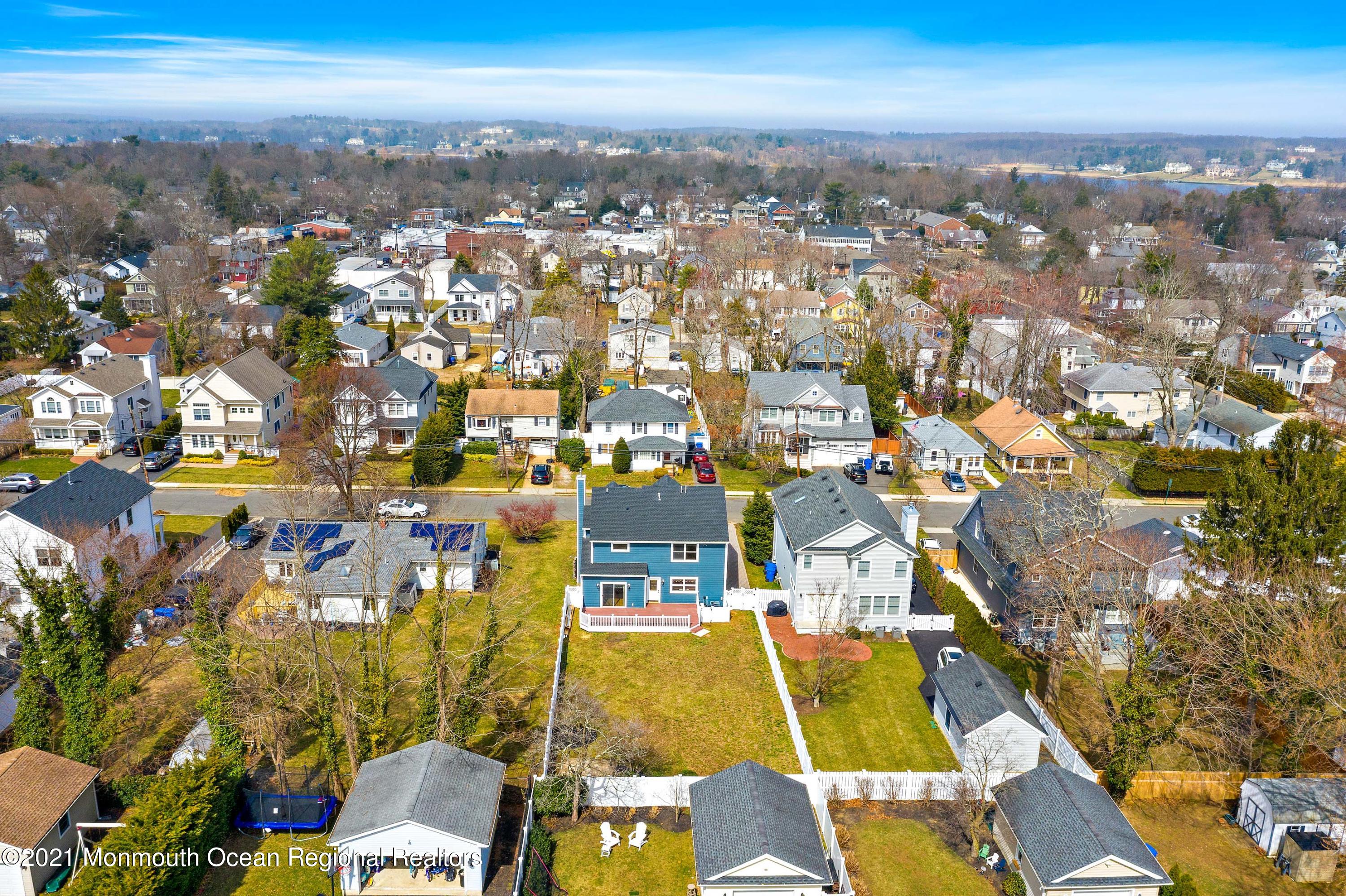 94 Jackson Street Fair Haven, NJ 07704 - Photo 69 of 83 an aerial view of residential houses with outdoor space
