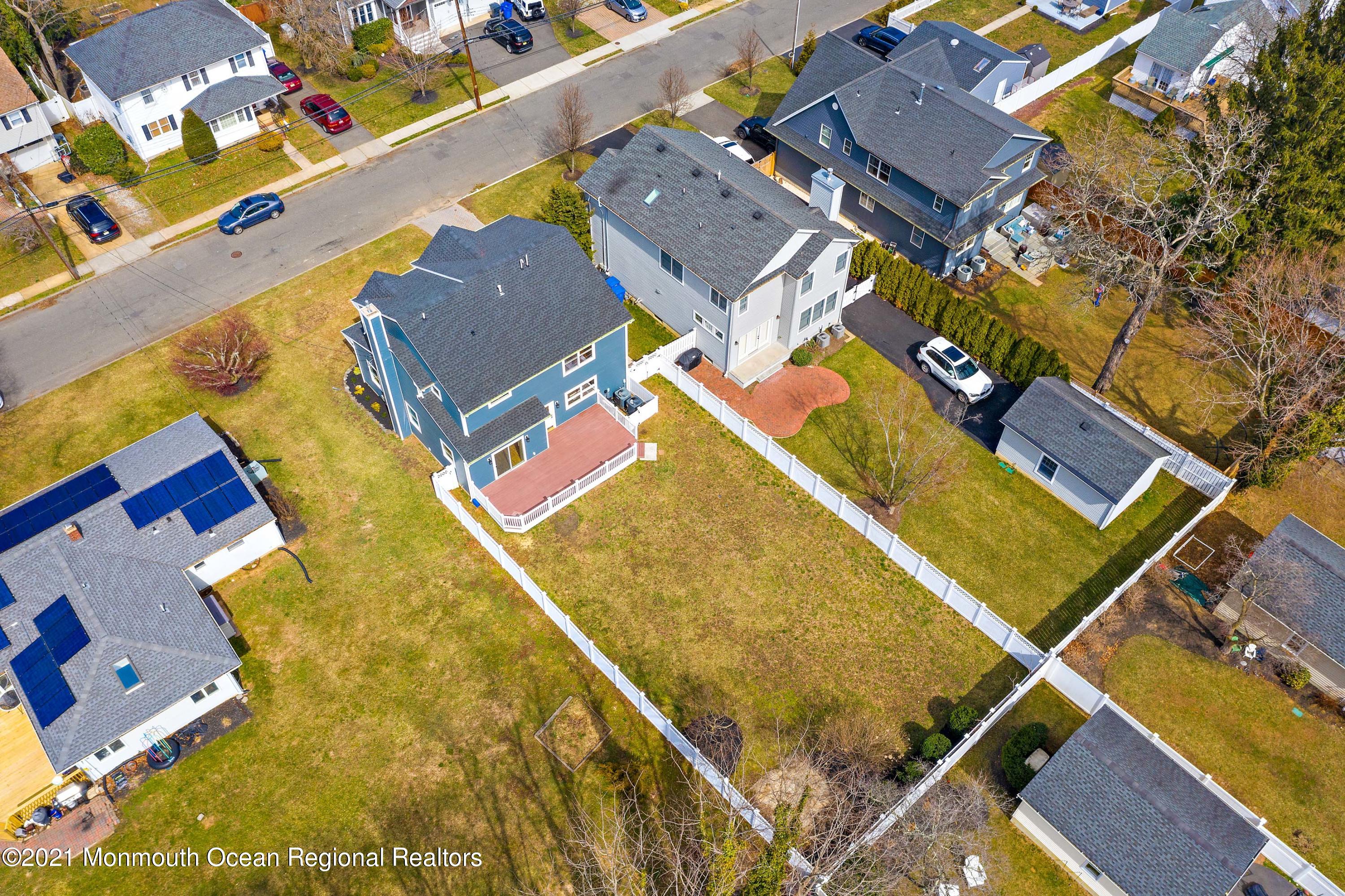 94 Jackson Street Fair Haven, NJ 07704 - Photo 73 of 83 an aerial view of residential houses with outdoor space